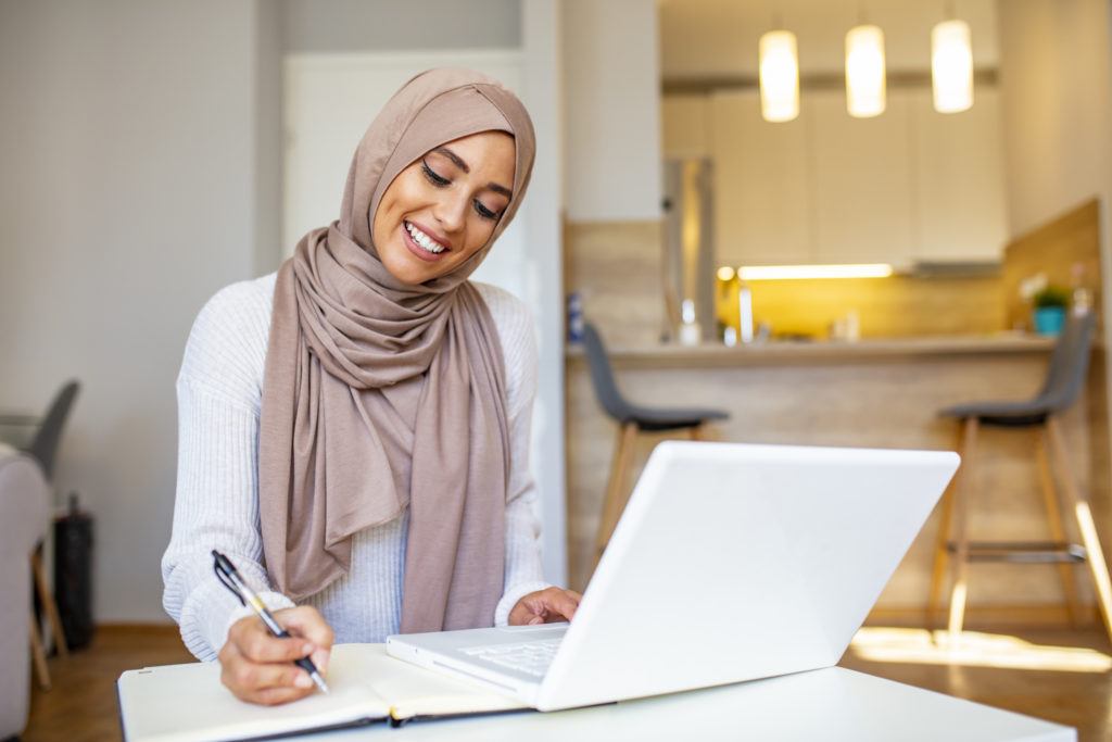 Hijabi woman working from home