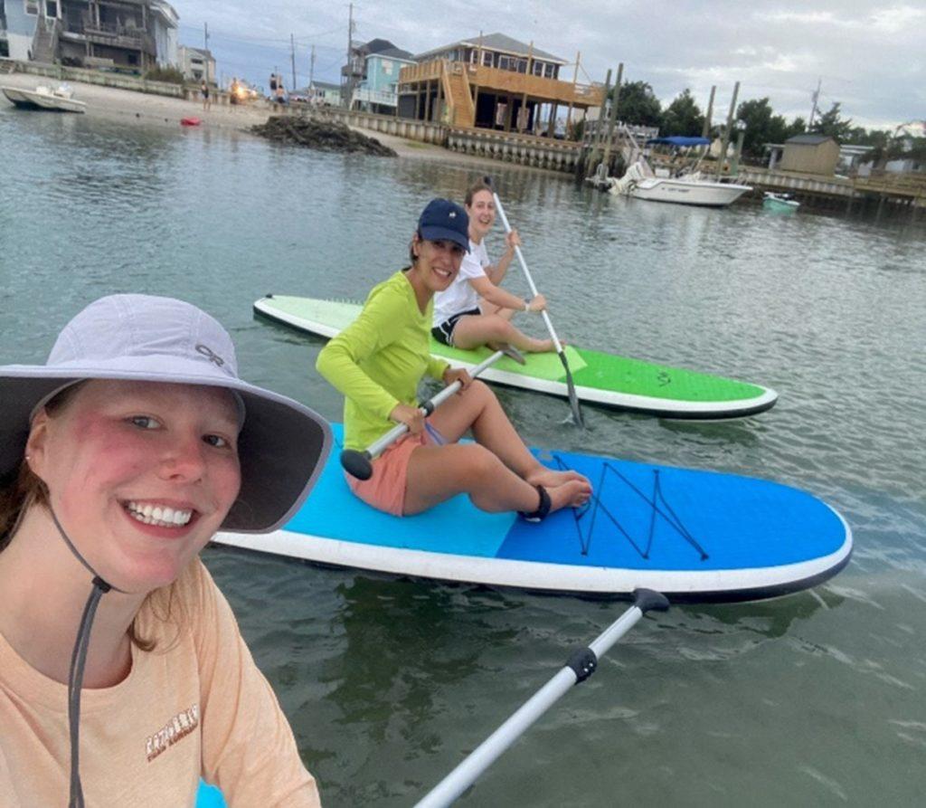 Savannah paddle boarding last summer in North Carolina with a few friends!