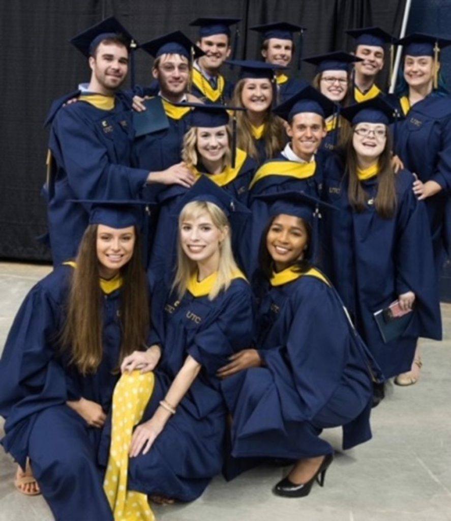 Summer and friends at her graduation from the University of Tennessee at Chattanooga.