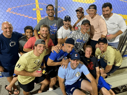 AJ and his teammates gathered to watch the 3v3 ball hockey championship game in Iowa.