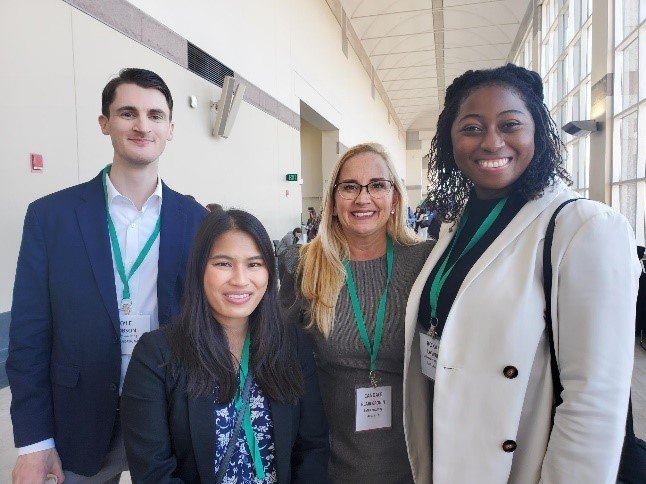 An image of FMPers posing for a group picture at SIOP.