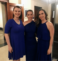 Christine backstage with fellow Alexandria Singers before a performance.